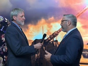 Elbit America's President & CEO Luke Savoie explains the importance of the SIGMA next-gen. howitzer to Breaking Defense's Barry Rosenberg at AUSA 2024.