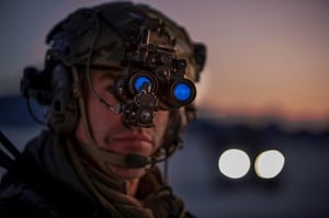 A United States Marine wears the Squad Binocular Night Vision Goggle by Elbit America. 